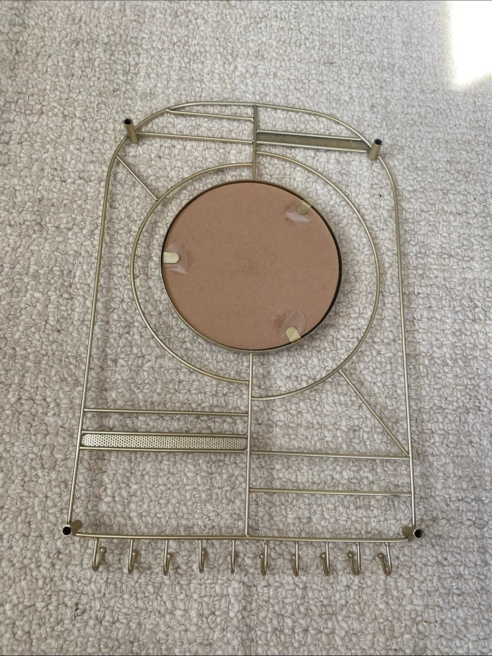 Gold Metal Wall Mirror with Jewelry Organizer